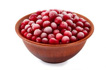 Bowl of frozen cranberries on white
