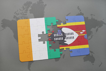 puzzle with the national flag of cote divoire and swaziland on a world map