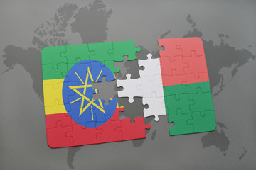 puzzle with the national flag of ethiopia and madagascar on a world map