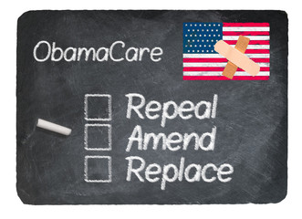 Obamacare concept using chalk on slate blackboard