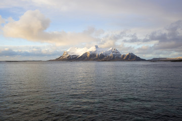 View of a Norwegian fjord with snowy mountains, Nordland, Norway