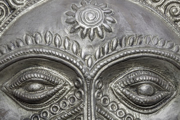Big Brother is watching you. Eyes of a traditional Sun God mask