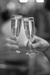 Celebration: cheering with a glass of champagne