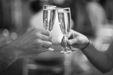 Celebration: cheering with a glass of champagne