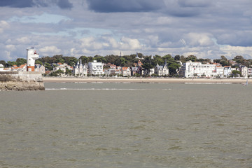 View of the coastline with seaside resort of Royan with grey tourmented sky, France