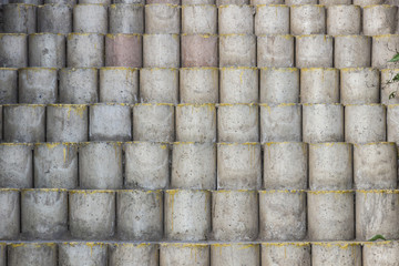 Ladder cement blocks. Cylindrical blocks of cement that form the steps of a stariway.