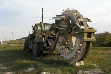 Fototapeta premium Khaki Color Massive Trench Machine.