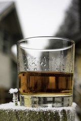 Whiskey on Frozen Fence Post