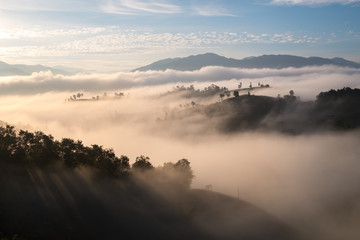 Fototapeta premium Misty aerial view in morning in Nan province, Northern of Thailand.