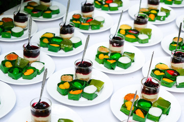 Thai dessert and blueberry cheeze pie in white plate