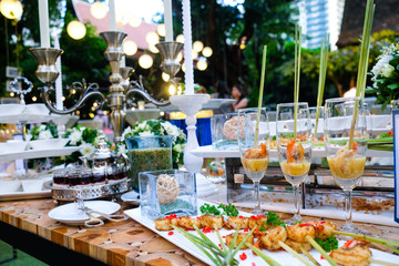 Extreme close up of appetizing grilled queen prawn tail brochett