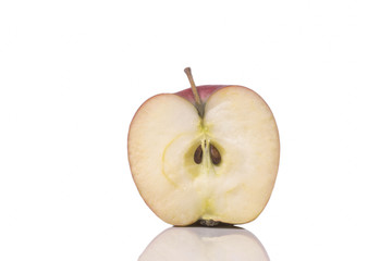 one half of a ripe apple cut