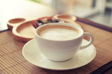 Confectioners atmosphere concept in vintage toned color. Cup of