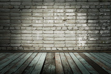 old room with brick wall