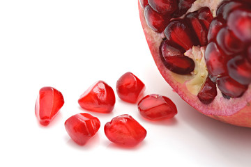 Closeup of pomegranate Seeds on a white background