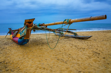 Aboriginal boat on the sandy shores