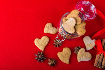 Jar with Cookies in the Shape of Hearts Anise Stars Cinnamon Sti