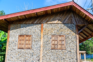 Masonry stone wall with grunge wood window
