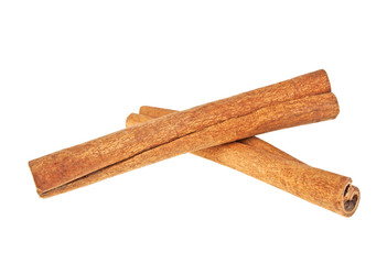 Two cinnamon sticks isolated on white background