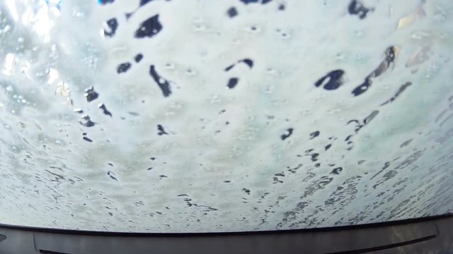 Soap inside a car wash