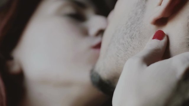 sex: young couple kissing passionately