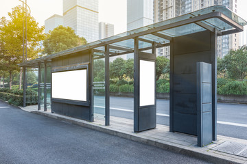 Blank advertising billboard at bus stop in city of China.