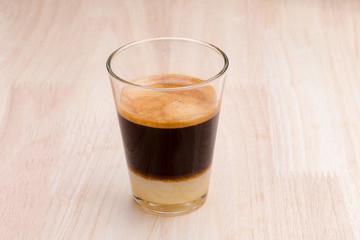 traditional Thai style hot coffee  on the wooden table.