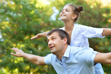  father with daughter outdoors