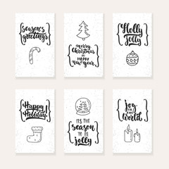 Set of 6 Christmas and New Year greeting cards with hand drawn brush lettering and sketch elements with braces. Holiday invitation.