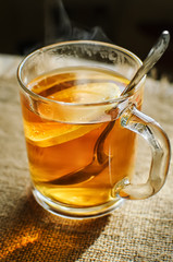 Tea with lemon in a glass