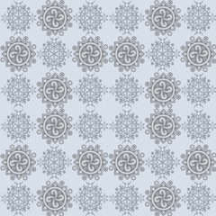 Abstract winter pattern with snowflakes.