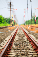 Railroad tracks stretching a long way for journey.