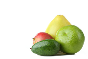 A variety of fresh tropical fruit,  isolated on white background.