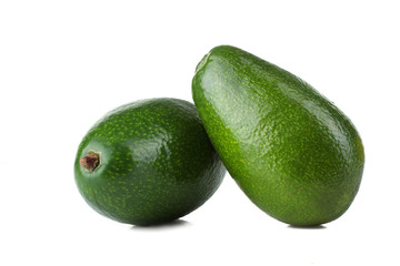 Fresh avocados isolated on white background.