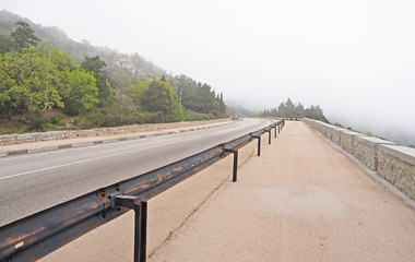road in the mountains in the mist
