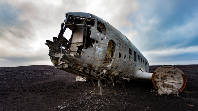 Wrecked plane on black sand beach near vik in soutz iceland in winter