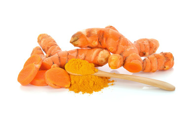 Turmeric roots with turmeric powder isolated on white background