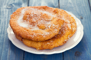 christmas portuguese cake Filhos with sugar on plate