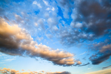 Sunset sky with dramatic clouds. Natural background.