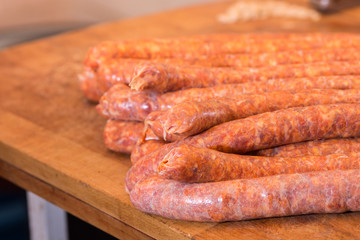 Homemade domestic red sausages on the table