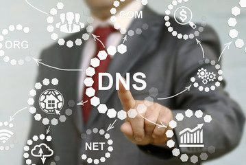 Businessman presses icon dns. Man touched acronym domain name system. Network, web, communication. DNS concept presented by businessman touching on virtual screen - image element furnished by NASA. - obrazy, fototapety, plakaty