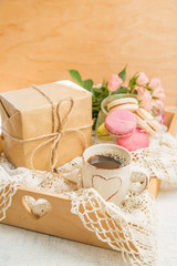 Morning coffee with flowers and macaroons. Mather's day  Valentine'  concept.