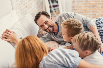 Obraz premium Happy family relaxing at home