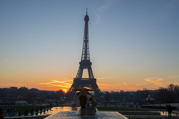 Fototapeta na wymiar The Eiffel tower at sunrise in Paris France