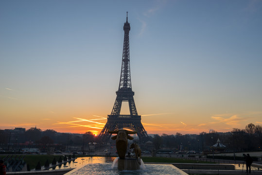 The Eiffel tower at sunrise in Paris France