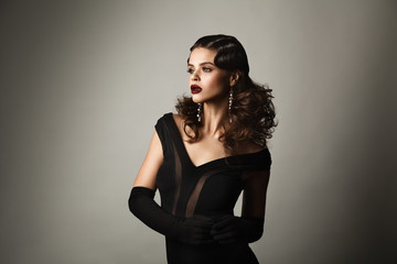 Beauty studio portrait of woman in retro style. Perfect makeup a