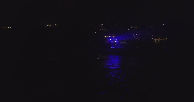 Party on club in Goa, India. Aerial view. Night