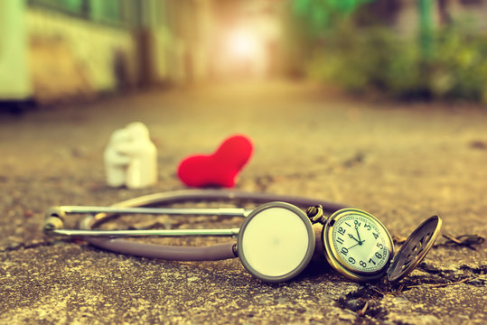 SKULL with Antique clock and stethoscope. Give time in To care for yourself for Long life CONCEPT. vintage style