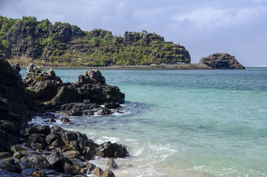 Dark rocks with turquoise water in Maconde,  Mauritius
