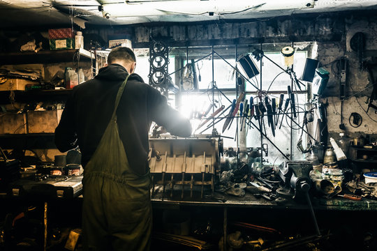 man working in the garage